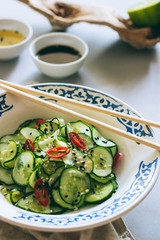 Thai cucumber salad with sesame and chili, dressing for salad, Asian cuisine