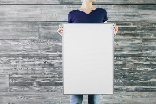 Woman Holding Empty Whiteboard