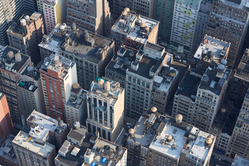 New York City Manhattan aerial view with buildings roof tops and streets