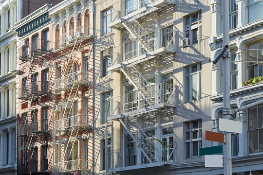 New York, cast iron architecture buildings in Soho in a sunny morning