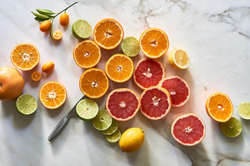 Cut citrus fruits for health and wellness on table