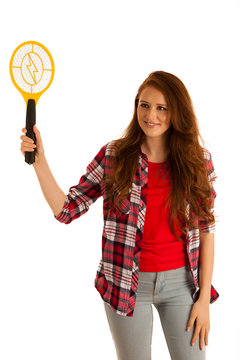 attractive Beautiful young woman holds electroc racket for kiling flys