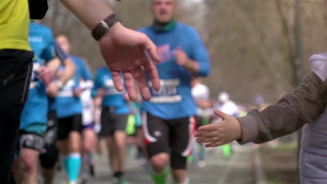 High quality videos of giving runners high five in real 1080p slow motion 250fps