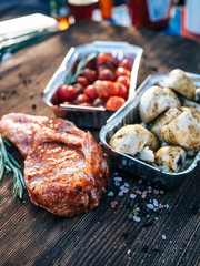 Raw meat with mushrooms and tomatoes before cooking