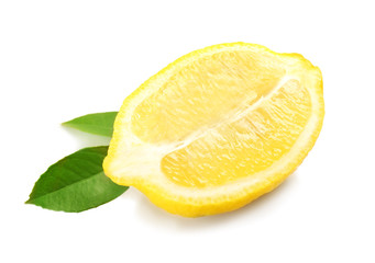 Half of fresh lemon and green leaves on white background