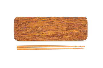 Wooden board and chopsticks on white background