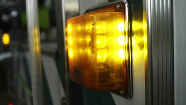 Flashing light on side of fire truck, close up