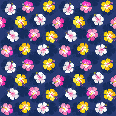 Cute seamless vector background pattern with colorful hibiscus flowers in pink, yellow and navy blue. For greeting cards, gift wrapping paper, textiles and wallpapers.