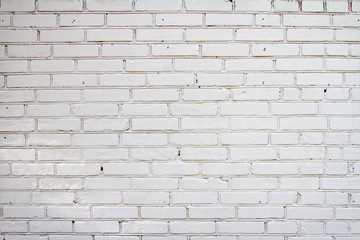 Old brick wall painted white