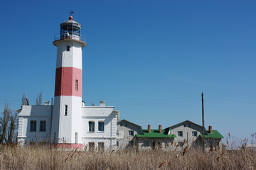 Old lighthouse against the blue sky.