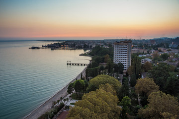 Evening sunset over black sea. Sukhum, Abkhazia. Aerial view