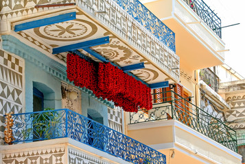 Balcony with tomatoes, Pyrgi, Chios - obrazy, fototapety, plakaty
