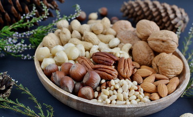 Assorted Mixed Nuts Peanuts Almonds Pecan Cashew Hazelnuts Macadamia Pine Black Background Healthy Concept