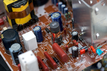 Fototapeta na wymiar Waste of board electronics, microcircuits, capacitors