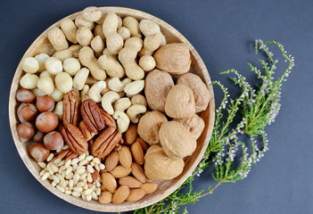 Assorted Mixed Nuts Peanuts Almonds Pecan Cashew Hazelnuts Macadamia Pine Black Background Healthy Concept