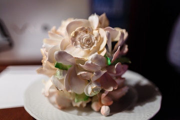 Beautiful wedding cake. New cake with a white cream on a festive table