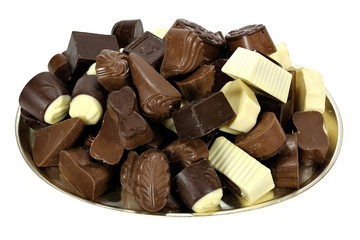 tray with Belgian chocolate pralines isolated on white background