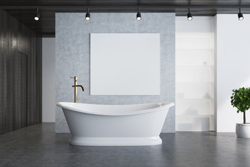 Fototapeta na wymiar Concrete bathroom, elegant tub and poster