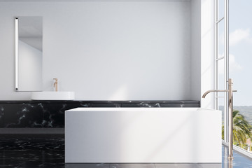 Concrete bathroom, rectangular tub, black