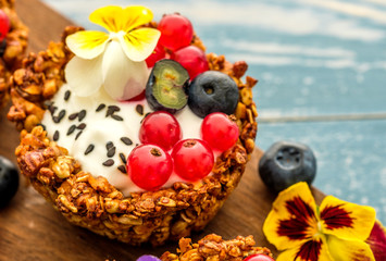 Dessert with sunflower seeds, yogurt and fresh berries