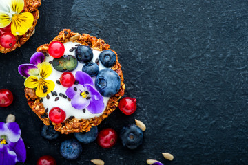 Dessert with sunflower seeds, yogurt and fresh berries