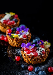 Fototapeta na wymiar Dessert with sunflower seeds, yogurt and fresh berries