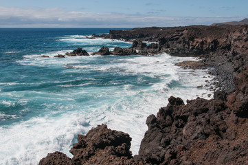 Fototapeta na wymiar Coastline with oceanic waves, Punta del marques, Lanzarote, Canary Islands