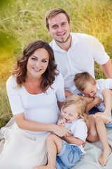 Fototapeta premium beautiful young happy family