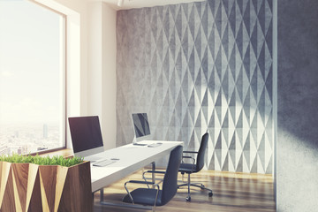 Gray diamond wall pattern open office, toned