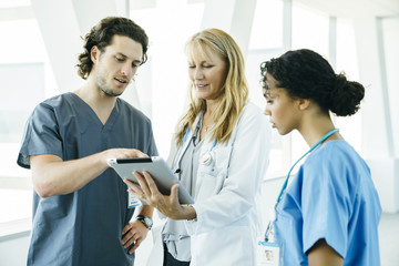 Group of medical professionals, doctor, nurses, in hospital  - Powered by Adobe