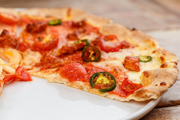 Artichoke pizza on a metal shovel