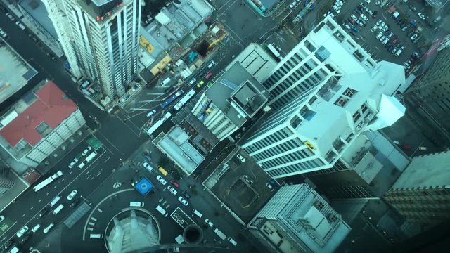 Unrecognizable person Skyjump off Auckland city Sky Tower.It's New Zealand's highest jump and only Base Jump by wire, Plummet 192 metres off the Sky Tower at 85 km an hour