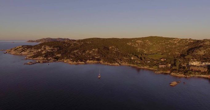 Aerial, beautiful bay in Sardinia island on sunset, 4K