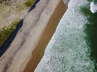 Fototapeta na wymiar Aerial of Waves and Cape Cod Beach