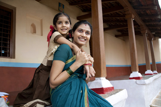 Portrait of a girl and her mother 