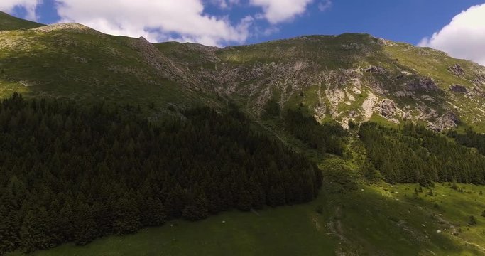 Aerial, green mountains in summer in Italy, 4K
