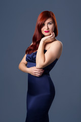 Fototapeta premium Elegant woman wearing blue dress