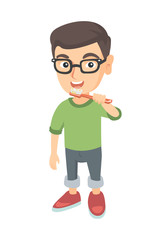 Caucasian little boy brushing his teeth. Happy boy cleaning his teeth. Cheerful boy in glasses holding toothbrush in hand. Vector sketch cartoon illustration isolated on white background.