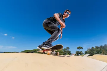 Foto op Canvas Skateboarder on a pump track park © homydesign
