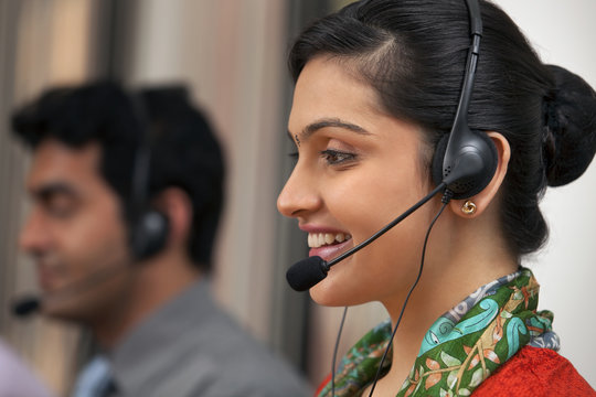 Female call center agent smiling