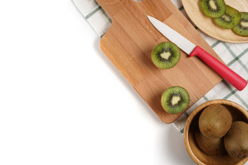 Top view fresh Kiwi fruit sliced on chopping board