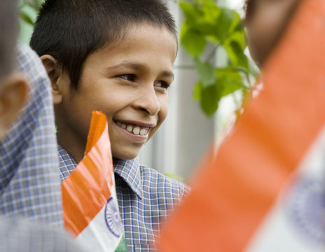 Smiling boy with Indian flag