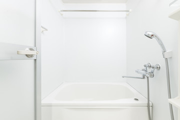 New white bathroom with bathtub and shower