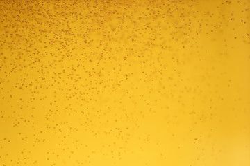 close up beer with bubbles background