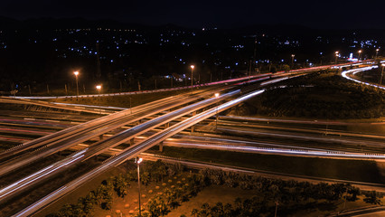 Fototapeta na wymiar over Road city highway at night - Bird eye viwe - drone -Top view