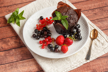 Chocolate cupcakes with summer berries.