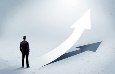 Arrow pointing up with standing salesman