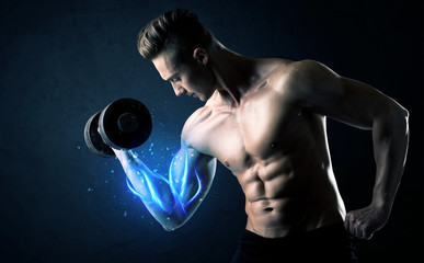 Fototapeta na wymiar Fit athlete lifting weight with blue muscle light concept