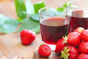Cold strawberry juice and fresh berries