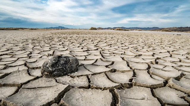 Time lapse moving over cracks in a dry muddy landscape in the Great Salt Lake desert.